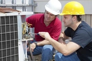 Our staff is performing air conditioning service 