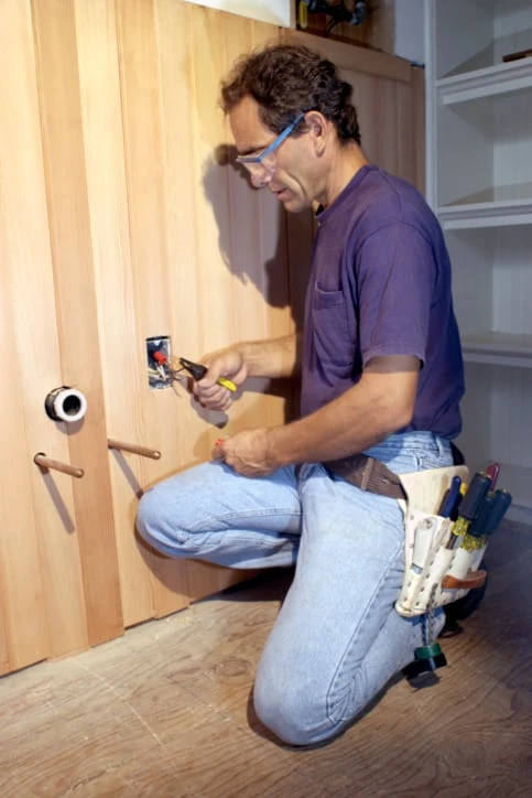 electrician fixing faucets